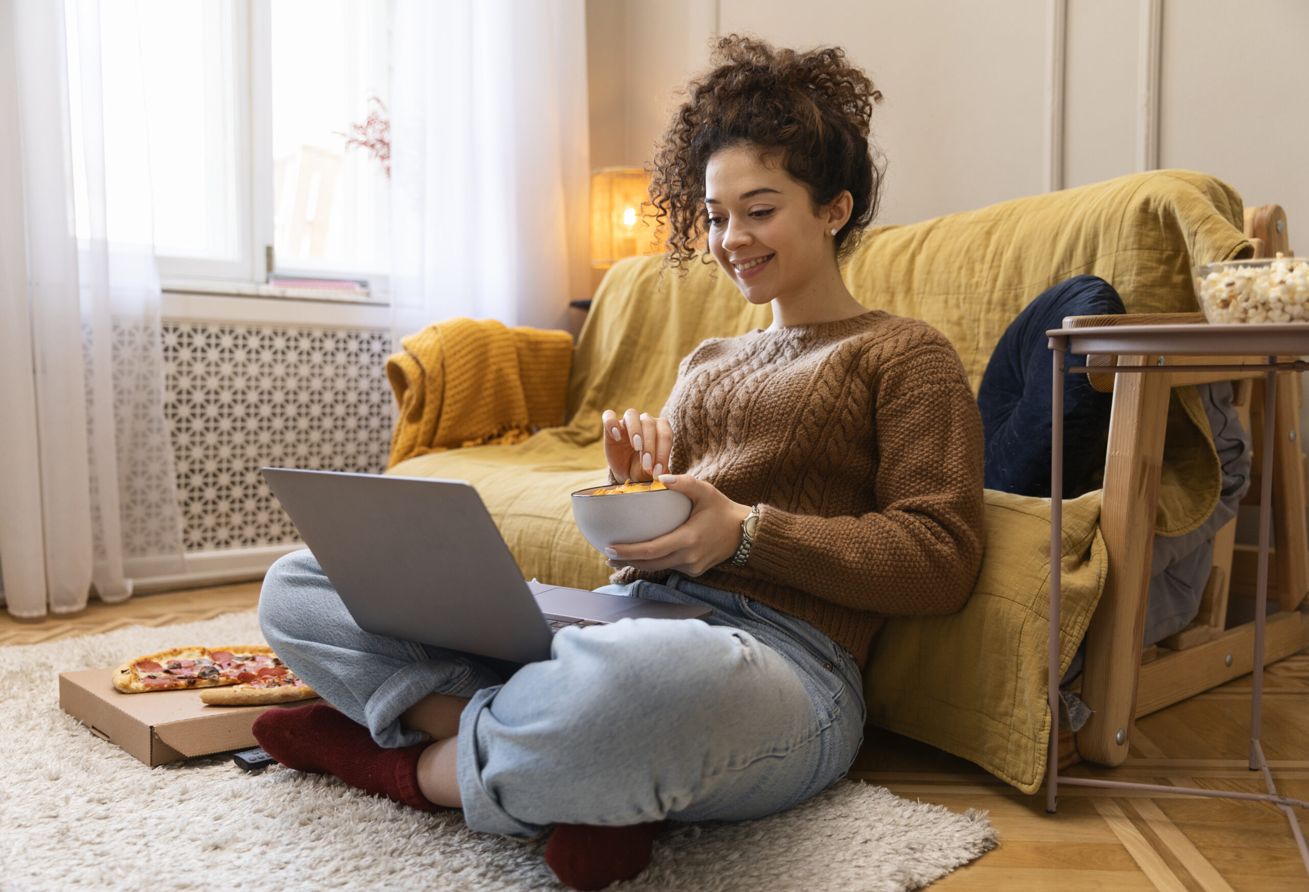 woman sitting in front of computer