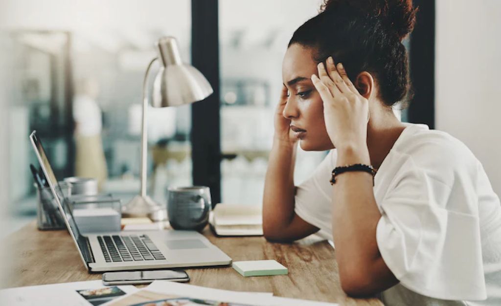 woman overwhelmed at work